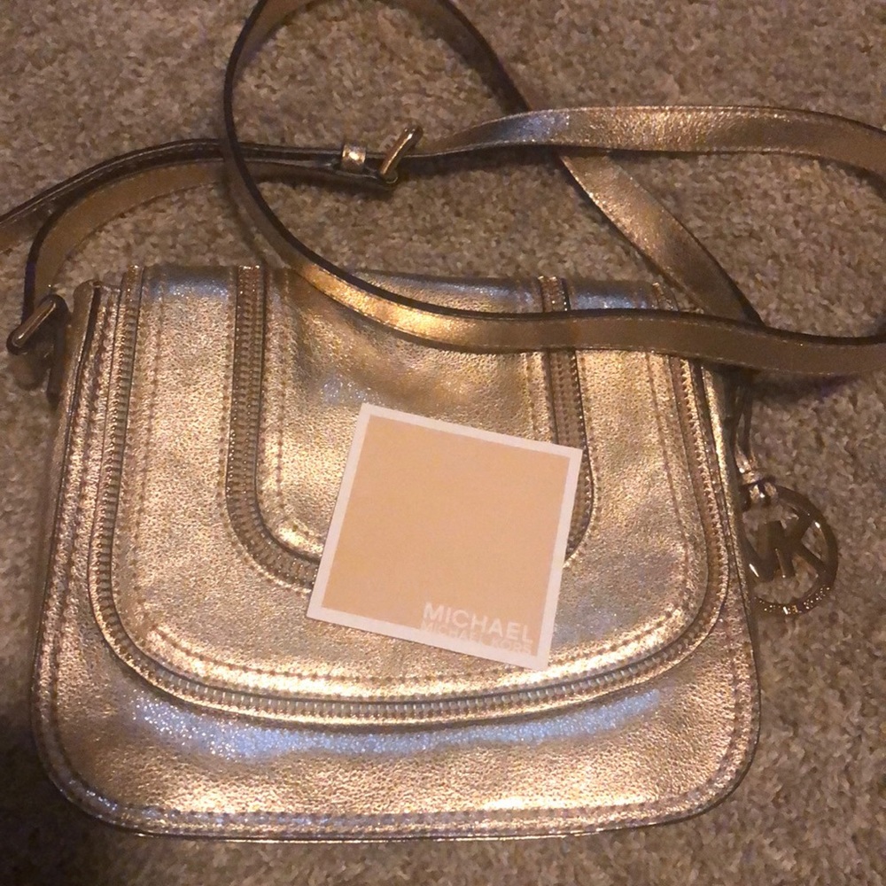 Gold Micheals Kors leather purse